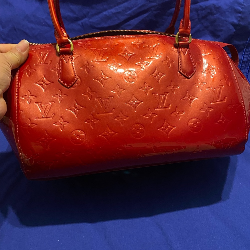Authentic Louis Vuitton bag in Red Vernis